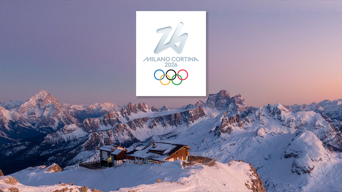 Winterlandschap in Noord-Italië met het logo van de Olympische Winterspelen van 2026